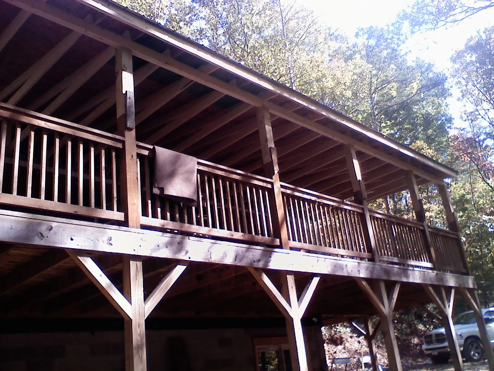 Timber framing under a new elevated porch and deck — Roof Leak Repair in Lavina by Roofing Brothers